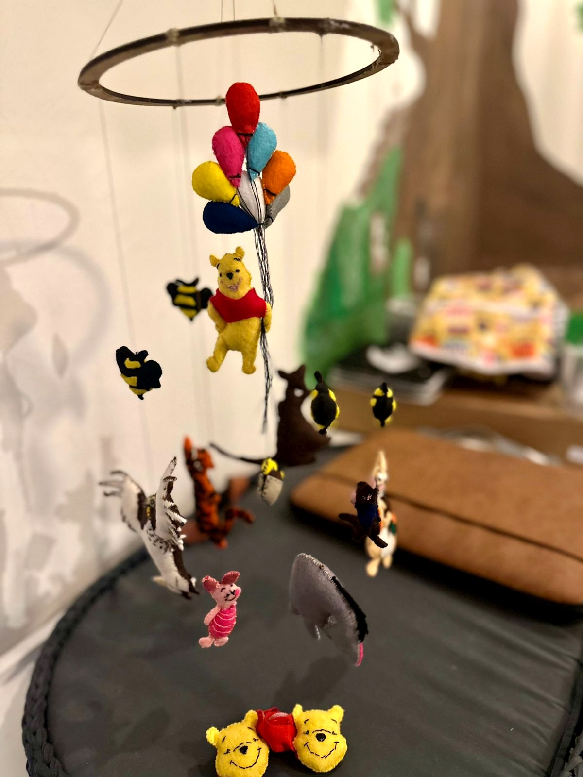 Handcrafted Winnie the Pooh baby mobile with colourful balloons